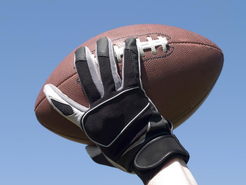 What Kinds of Accessories Should a Quarterback Wear During a Football