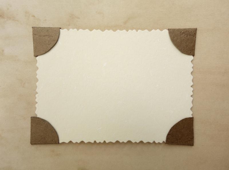 How to Put Photos on a Bulletin Board Without Making Holes eHow