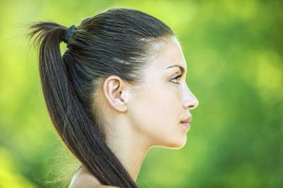 woman with tight ponytail